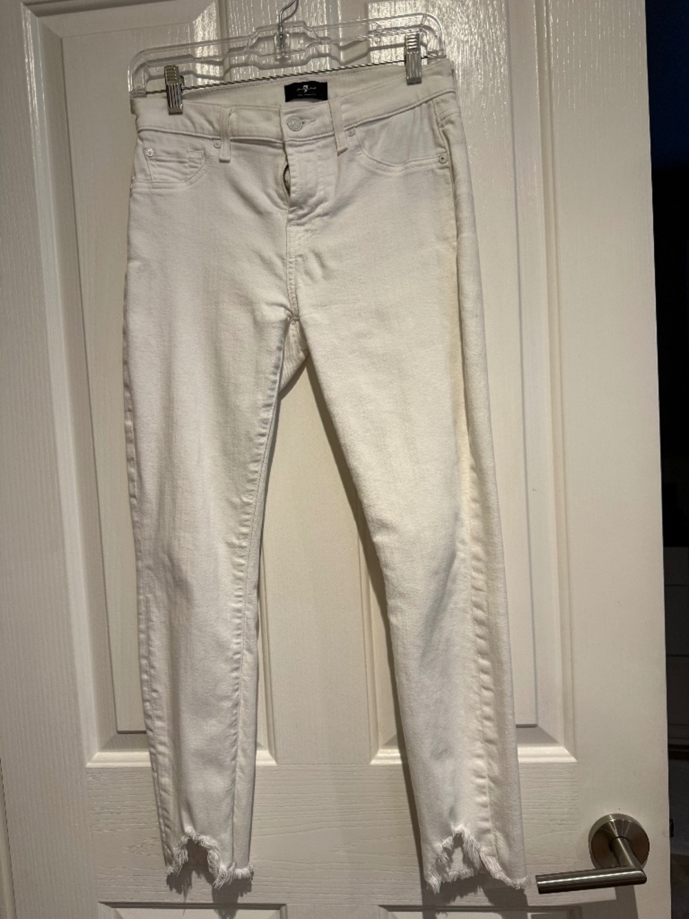 7 for all Mankind, white denim pants with front ankle cut out.  Size 26